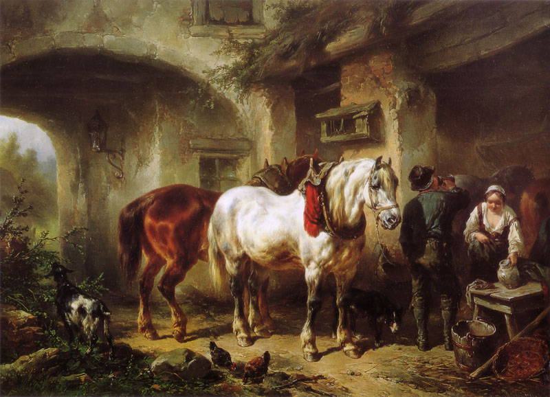 Horses and people in a courtyard